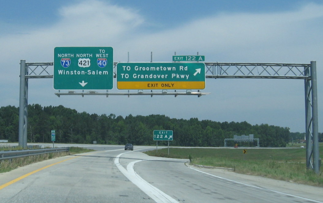 Photo of signage at merge between Greensboro Loop (US 421 North) and I-73 
North in June 2009