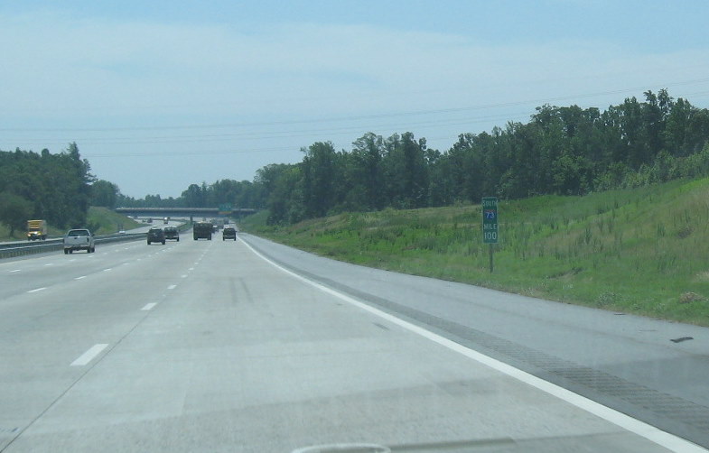 Photo of I-73 South milemarker 100 near site of future High Point Road 
exit, June 2009