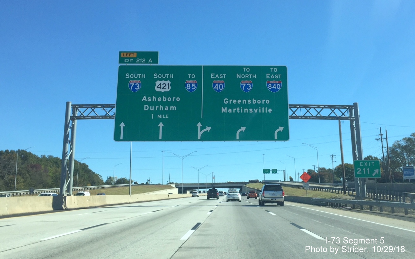 Image of newly placed arrow-per-lane 1 mile advance overhead sign for I-73 exits on I-40 East in Greensboro