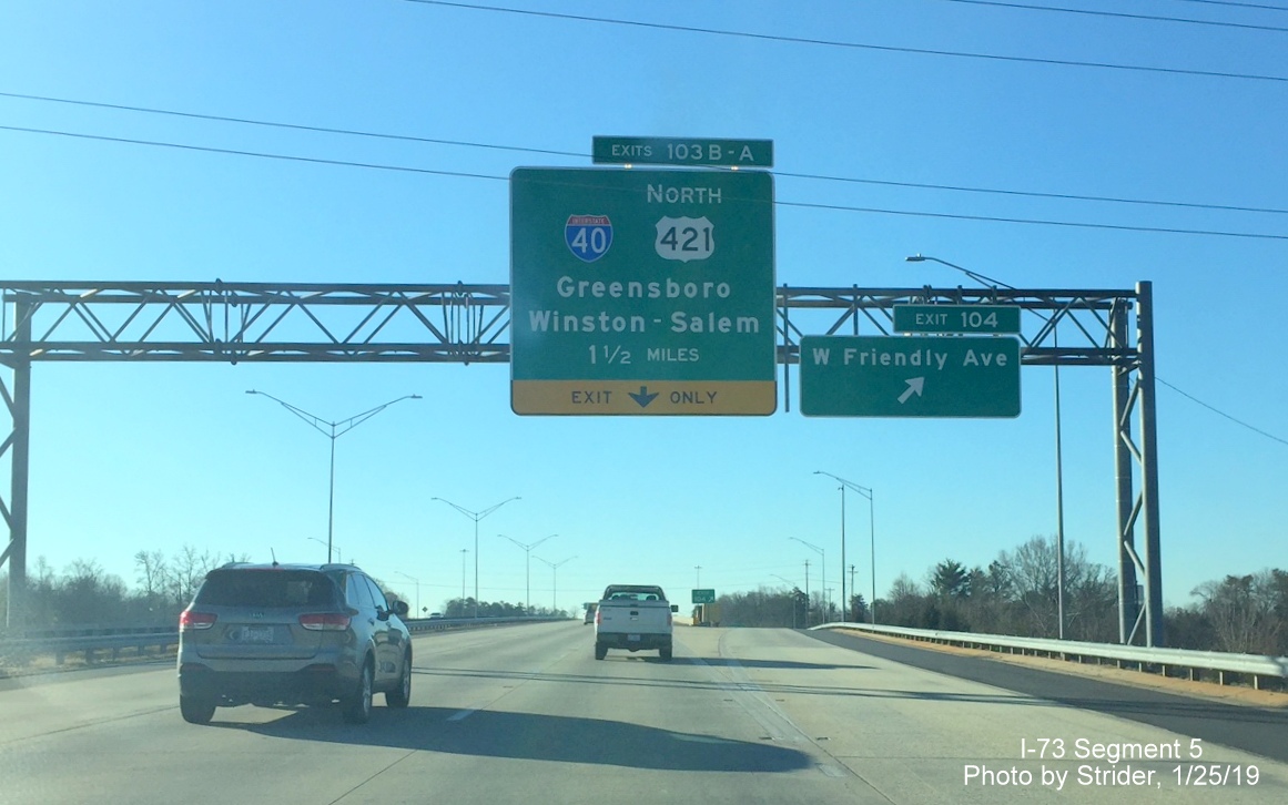 Image of newly placed overhead signs for I-40 and W. Friendly Ave. exits on I-73 South/I-840 West Greensboro Loop, by Strider