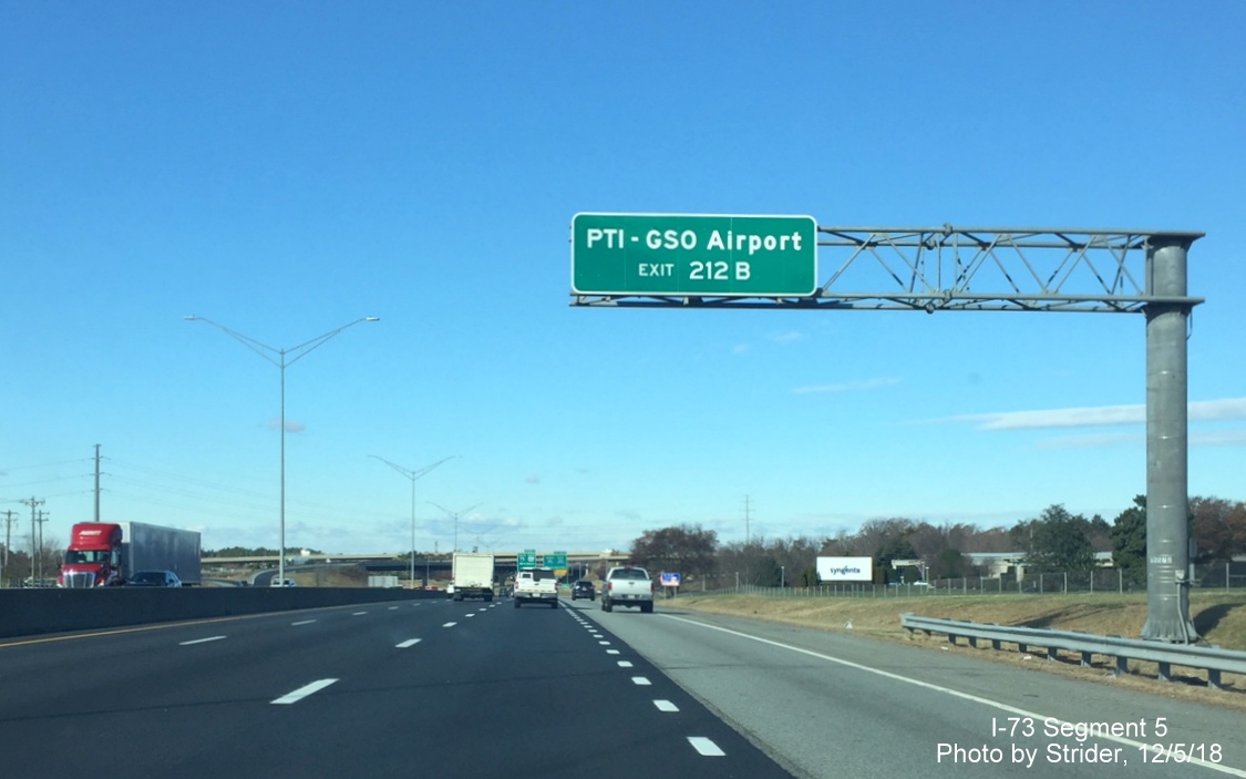 Image of new overhead auxiliary sign for PTI Airport prior to I-73 North/I-840 East Greensboro Loop exit on I-40 West, by Strider