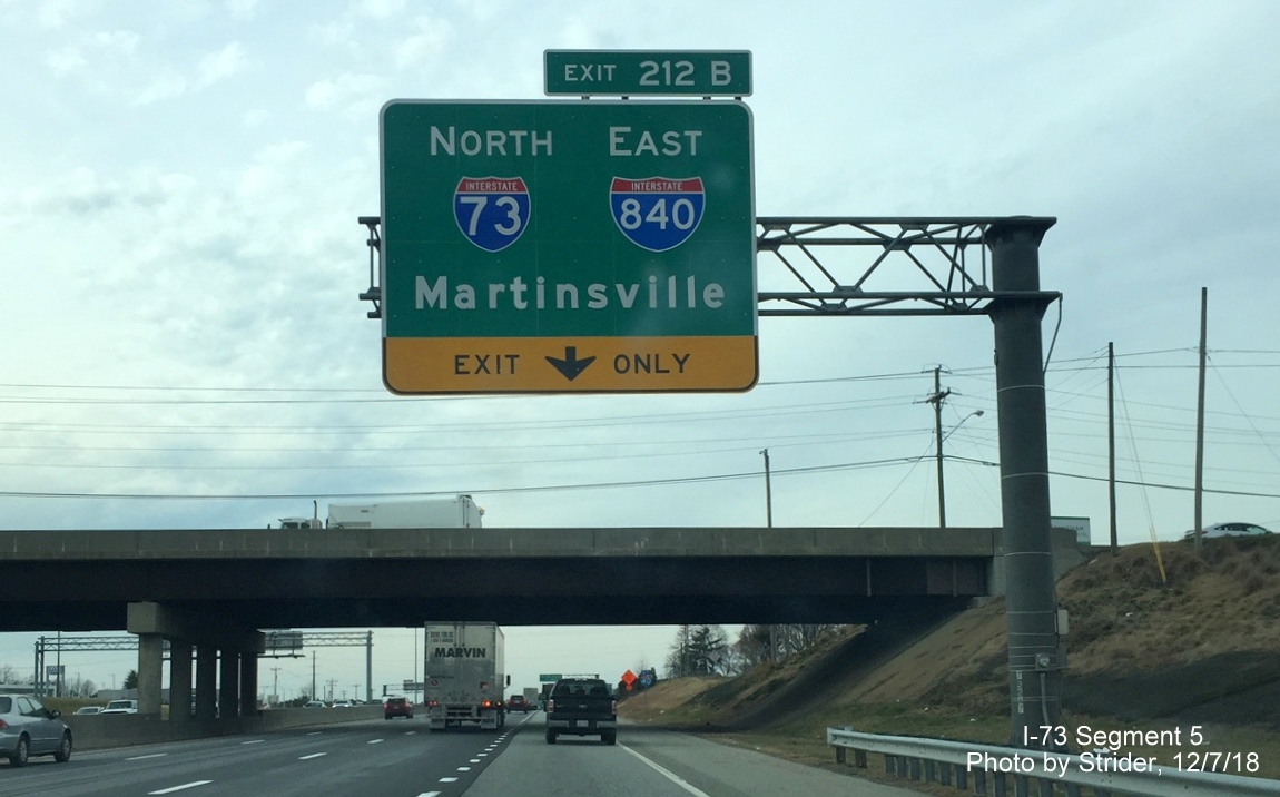 Image of newly placed completed 1/2 mile advance overhead sign for North I-73/East I-840 Greensboro Loop exit on I-40 West, by Strider