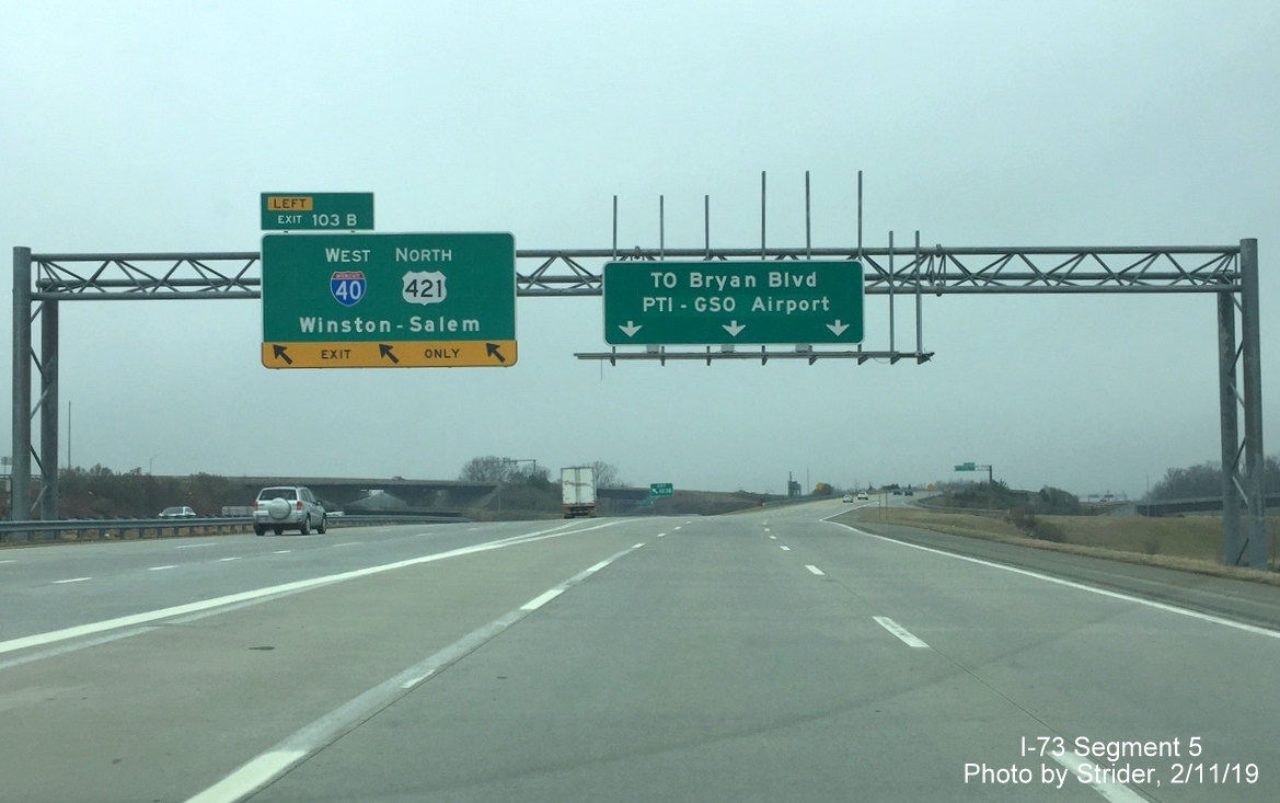 Image of newly placed sign for I-40 West exit, without new I-73 sign, on gantry on I-73 North in Greensboro, by Strider