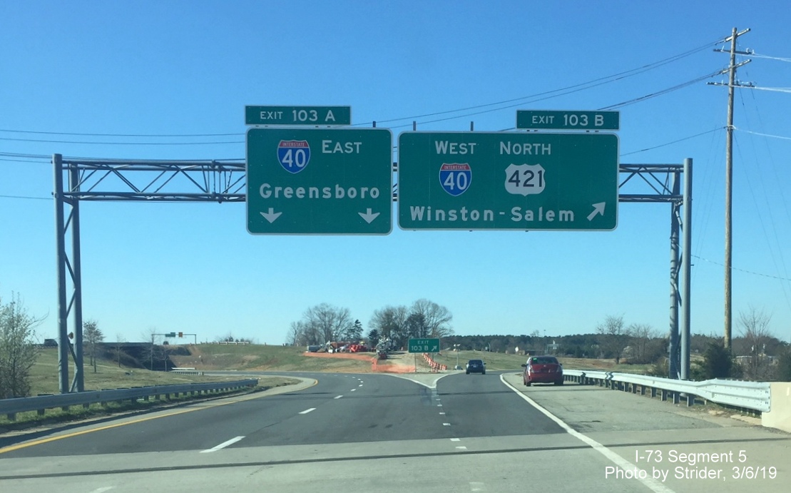 Image of recently updated overhead signage for I-40 exits on I-73 South/Greensboro Loop in March 2019, by Strider
