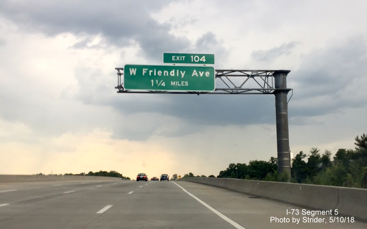 Image of overhead sign with new I-73 mileage based exit number for W. Friendly Avenue on I-73 North/I-840 East Greensboro Urban Loop,
      by Strider