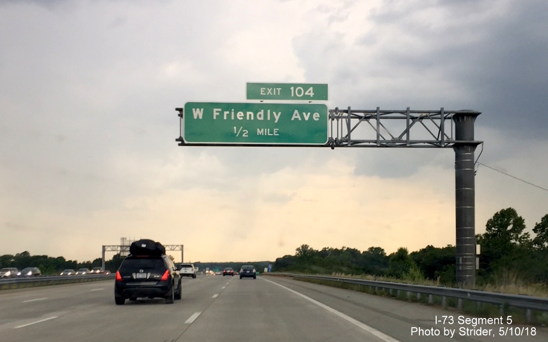 Image of overhead sign with new I-73 mileage based exit number for W. Friendly Avenue on I-73 North/I-840 East Greensboro Urban Loop,
     by Strider
