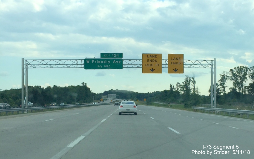Image of 3/4 mile overhead advance sign for W. Friendly Ave. exit on I-73 South/I-840 West Greensboro Loop with new I-73 mileage based
      number, by Strider