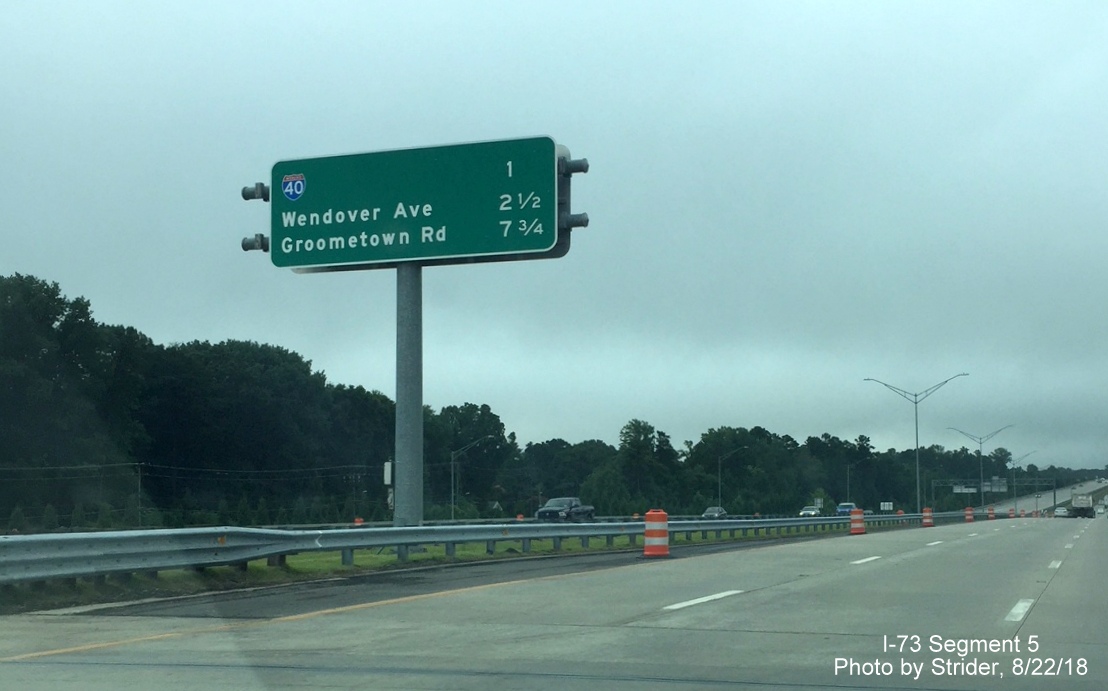 Image of newly placed center median interchange distance sign on I-73 South in Greensboro, by Strider