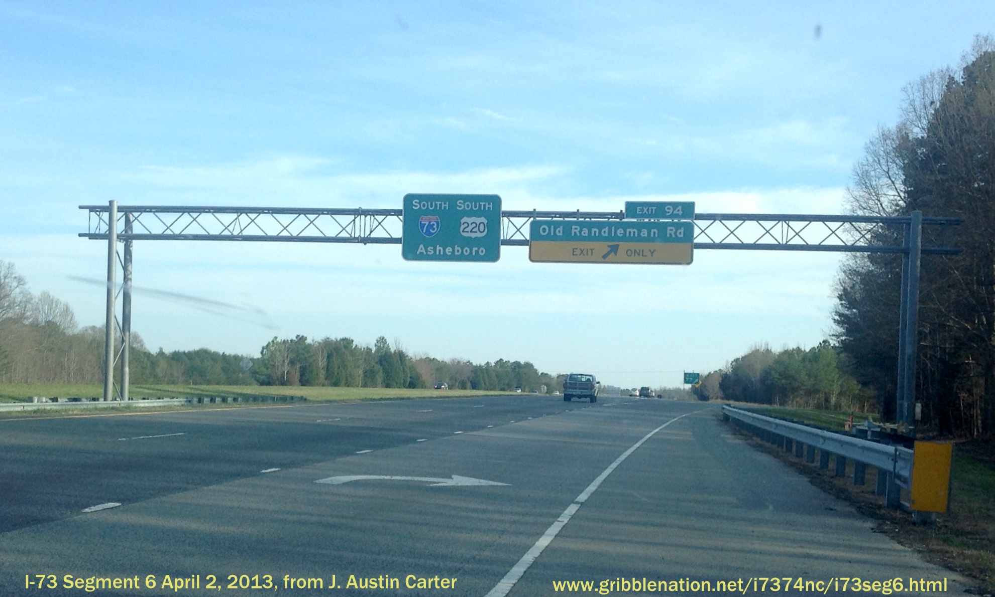 Photo of new I-73 shield added to pull through signage overhead for now Exit 
96 for Old Randleman Rd in April 2013, Courtesy of J. Austin Carter