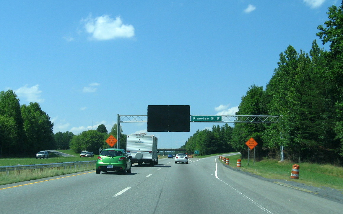 Photo of overhead sign assembly approaching Future I-74 interchange with 
US 220 (I-73) North, July 2012