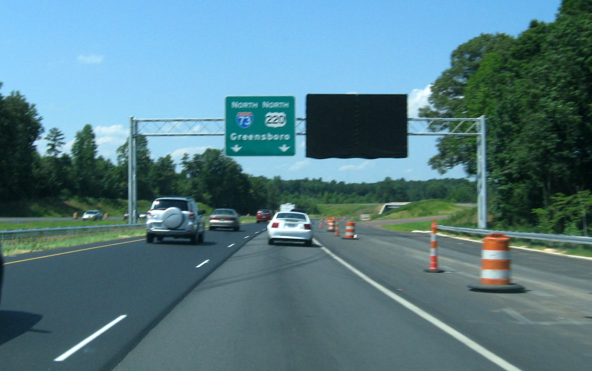 Photo of new overhead signage placed in July 2012 and covered at future I-74 
exit on US 220 (Future I-73) North