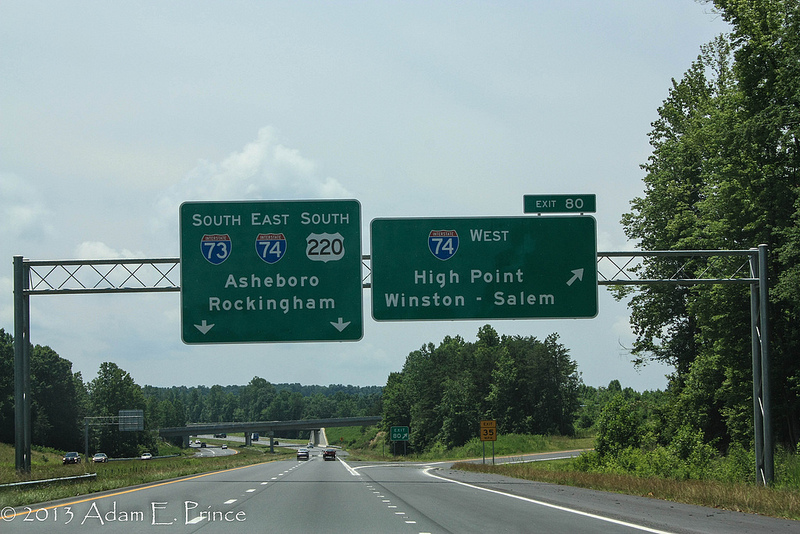 Photo of new overhead signage for completed I-74 interchange on 
I-73 South near Randleman