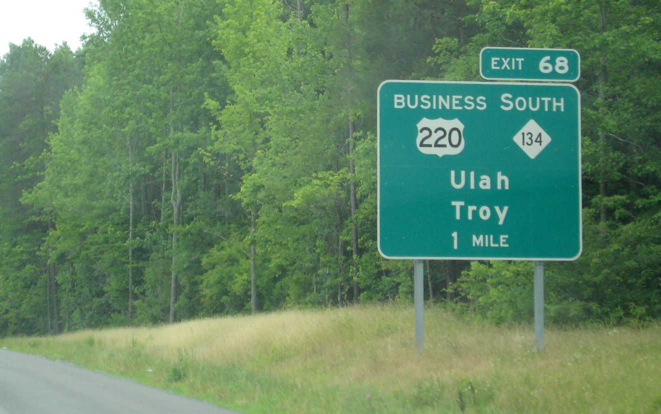 Photo of new exit sign for US 220 Business/NC 134 with New Exit Number 68