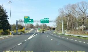 Photo of overhead signs at the NC 42 exit along I-73, US 220 North/I-74 West 
in Asheboro, Apr 2013