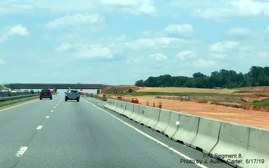 Image of closer look at exit ramps under construction for future US 64 Asheboro Bypass from I-73 South/I-74 East, by J. Austin Carter
