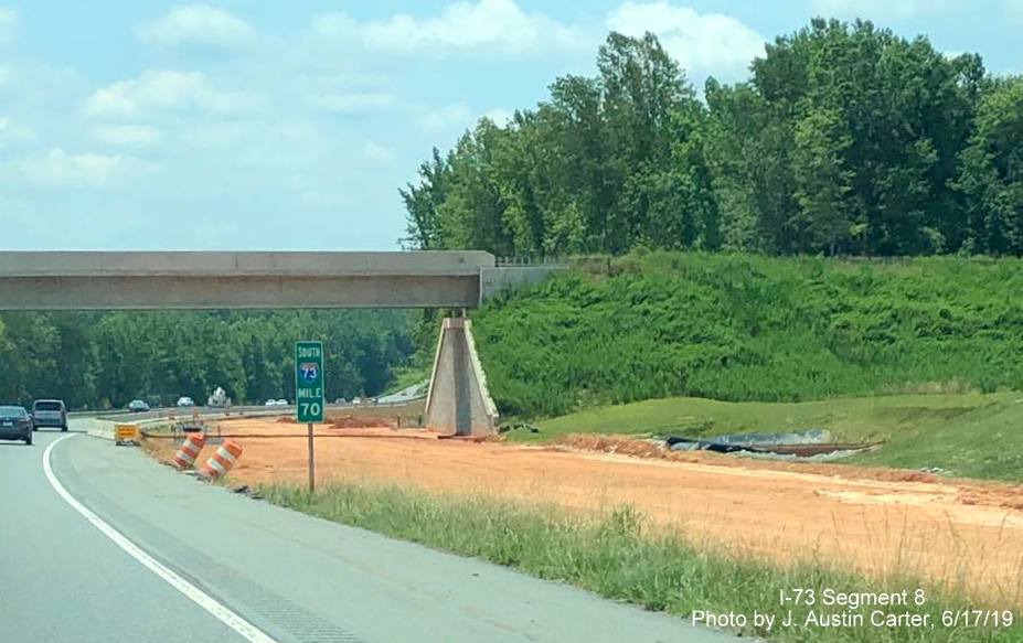 Image of I-73 milemarker in US 64 Asheboro Bypass Project work area, by J. Austin Carter