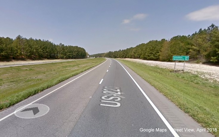 Google Maps Street View image of post-interchange distance sign on I-73/US 220 North, I-74 West 
        after NC 211 exit in Candor in April 2018
