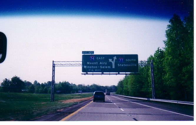 Photo showing exit signage at the Split of South I-77 and East I-74