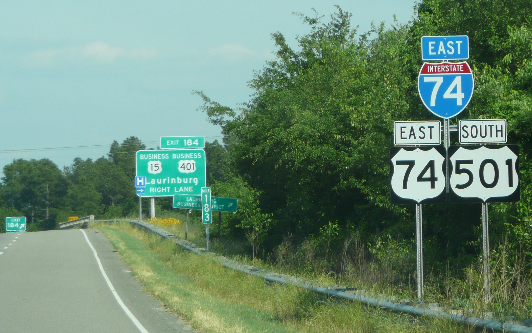 Photo of Bus. US 15 and 401 exit signs in May 2009, courtesy of Jim Mast