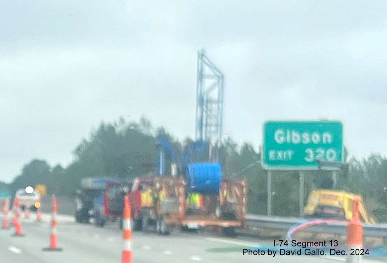 Image of fiber optic cable installation work on US 74 (Future I-74) East 
        in Hamlet, by David Gallo, December 2024