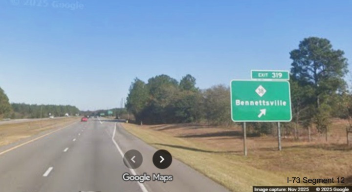 Image of ground mounted ramp sign for the NC 38 exit on I-74/US 74 East in Hamlet,
Google Maps Street View, November 2025