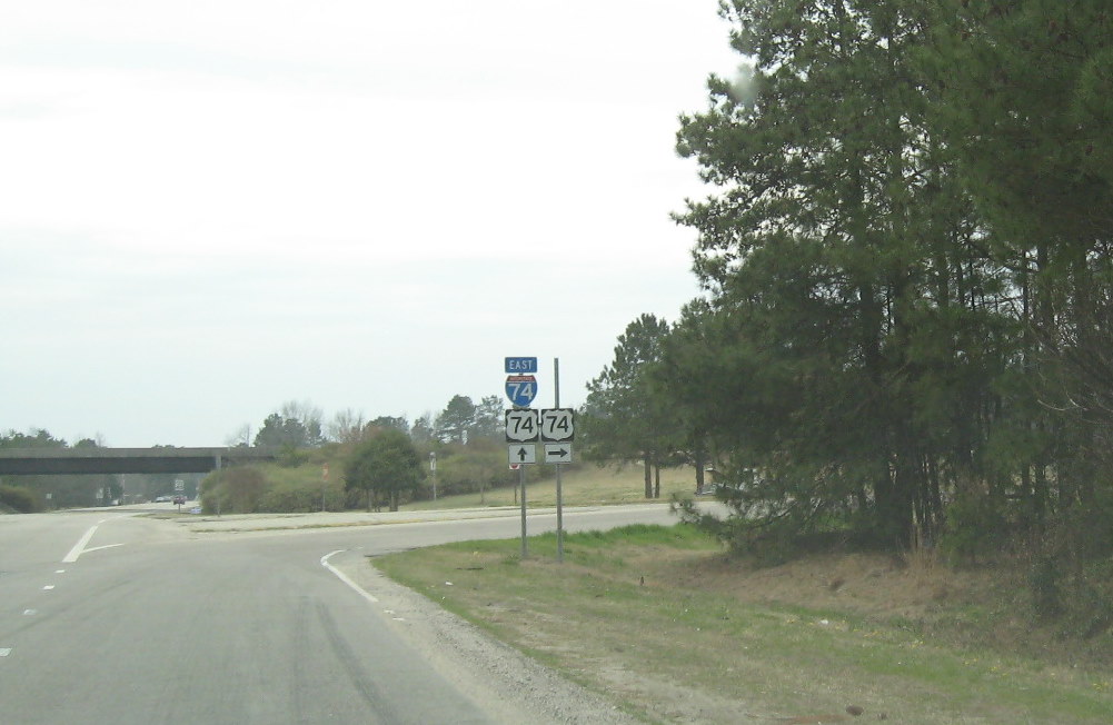 Photo of signage at on-ramp from NC 71 to Maxton Bypass, showing still
existing I-74 East signage, March 2010