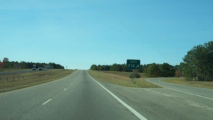 Photo of exit gore sign for then Exit 216 on Laurinburg Bypass in Dec. 
2008