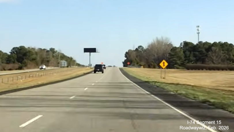 Image of newly paved shoulders on both sides of US 74 (Future I-74) East in 
	  Maxton, screen grab from Roadwaywiz video, February 2026