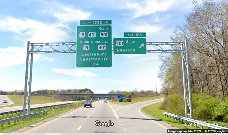 Image of new overhead signs for US 15, US 401, US 501 North and US 501 South exits on US 74 (Future I-74) West 
        in Laurinburg, Google Maps Street View, March 2023