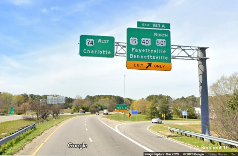 Image of new overhead signage with US 74 West pull through at ramp for US 15/401/501 North exit on 
        US 74 (Future I-74) West in Laurinburg, Google Maps Street View, March 2023