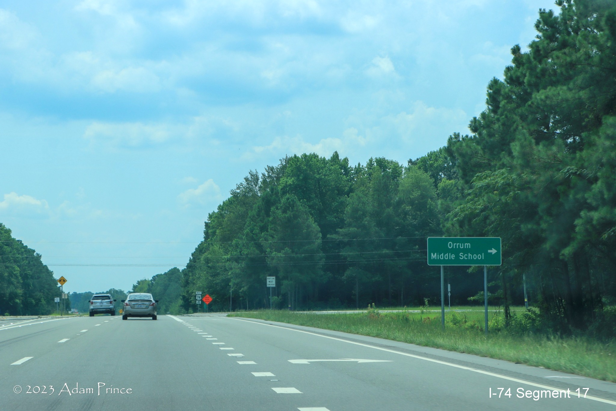 Image of signage on US 74 East approaching the Creek Road intersection just prior to the NC 
        72/NC 130 interchange construction zone, Adam Prince, July 2023