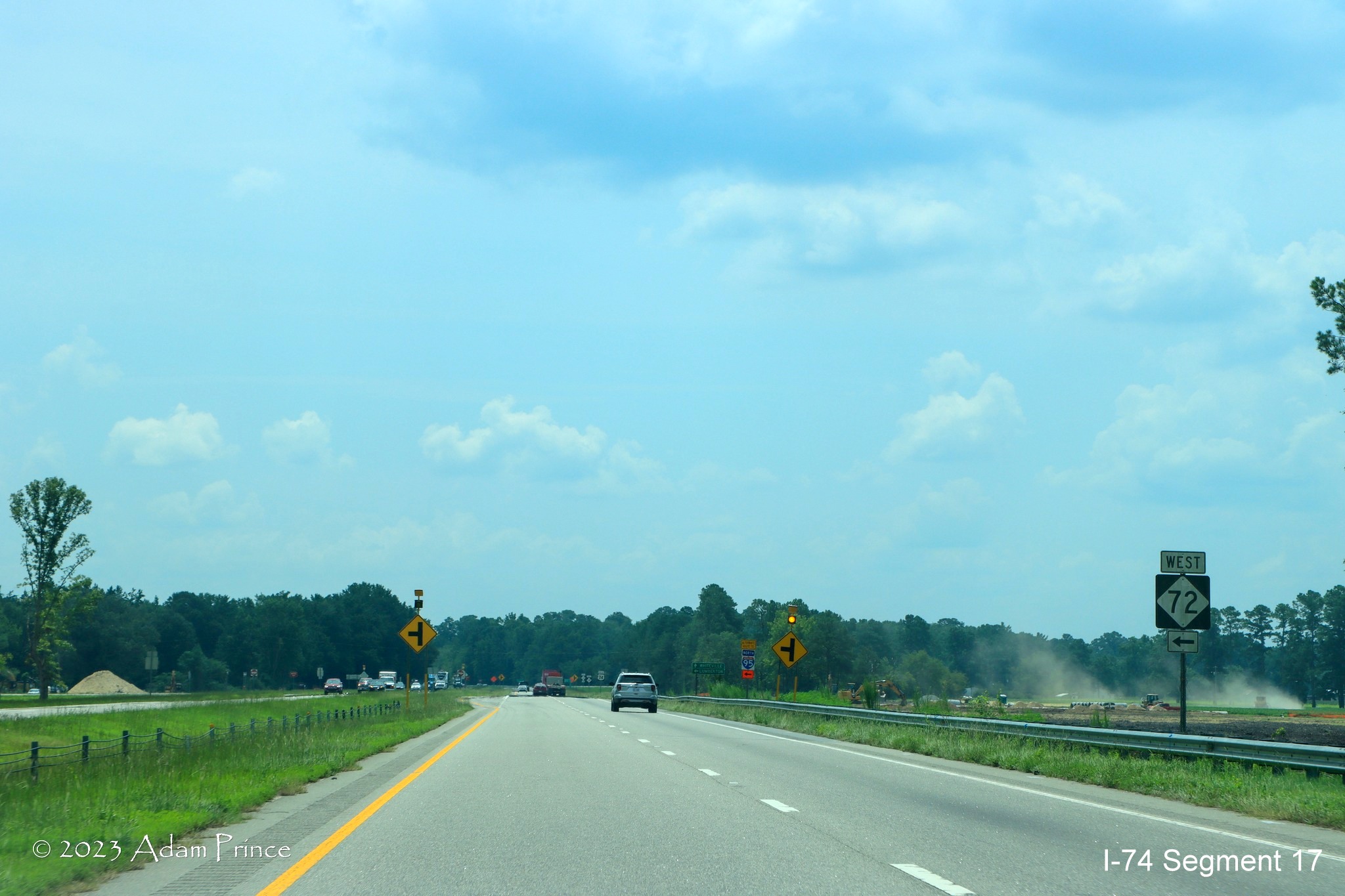 Image of West NC 72 signage on US 74 East in the NC 72/NC 130 interchange construction zone, 
        Adam Prince, July 2023