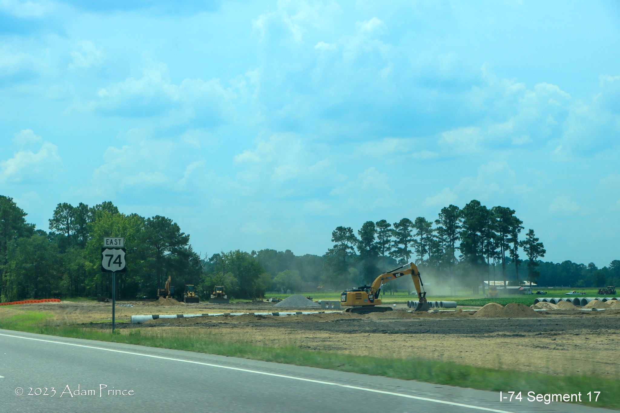Image of construction activity along US 74 East in the NC 72/NC 130 interchange construction zone, 
        Adam Prince, July 2023