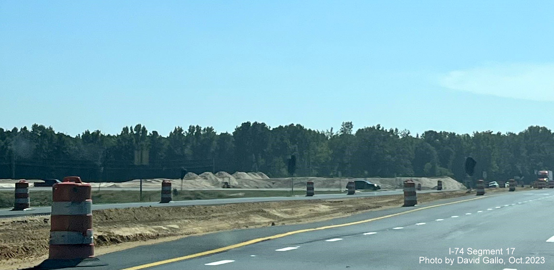 Image showing median construction and soil placement along NC 72 West from US 74 East near Boardman in interchange 
       construction area, by David Gallo, October 2023