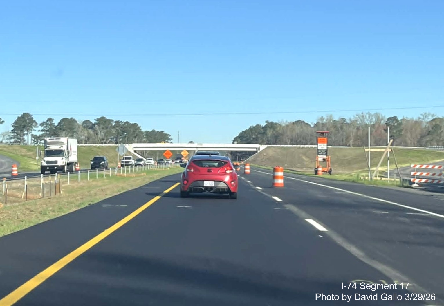 Image passing the future NC 72/ 130 West interchange on US 74 (Future I-74) East in 
	  Robeson County showing line painting complete but signage not, Google Maps Street View, February 2026