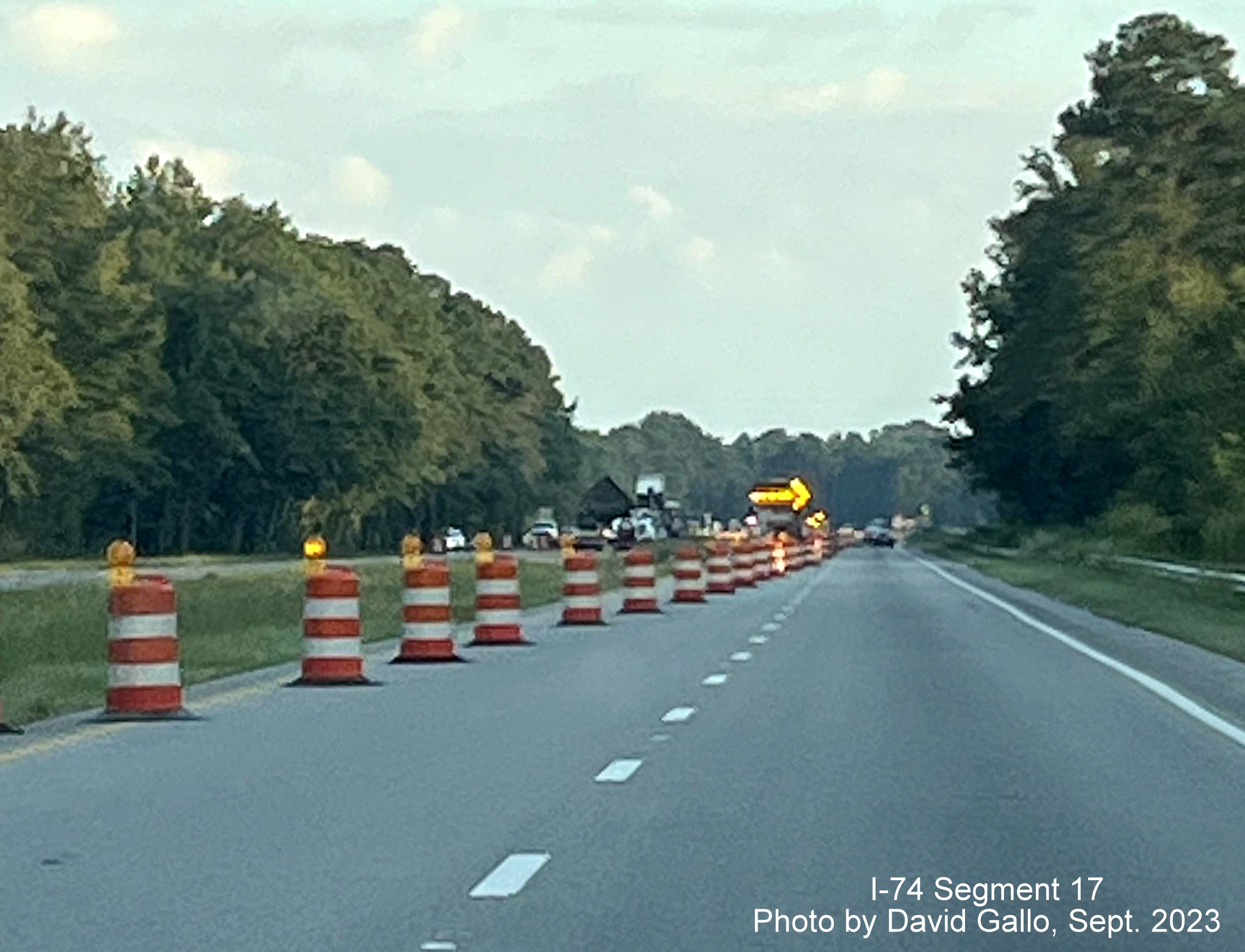 Image of VMS warning of left lane closure at the closed NC 72 intersection on 
         US 74 West in interchange project work zone, David Gallo, September 2023