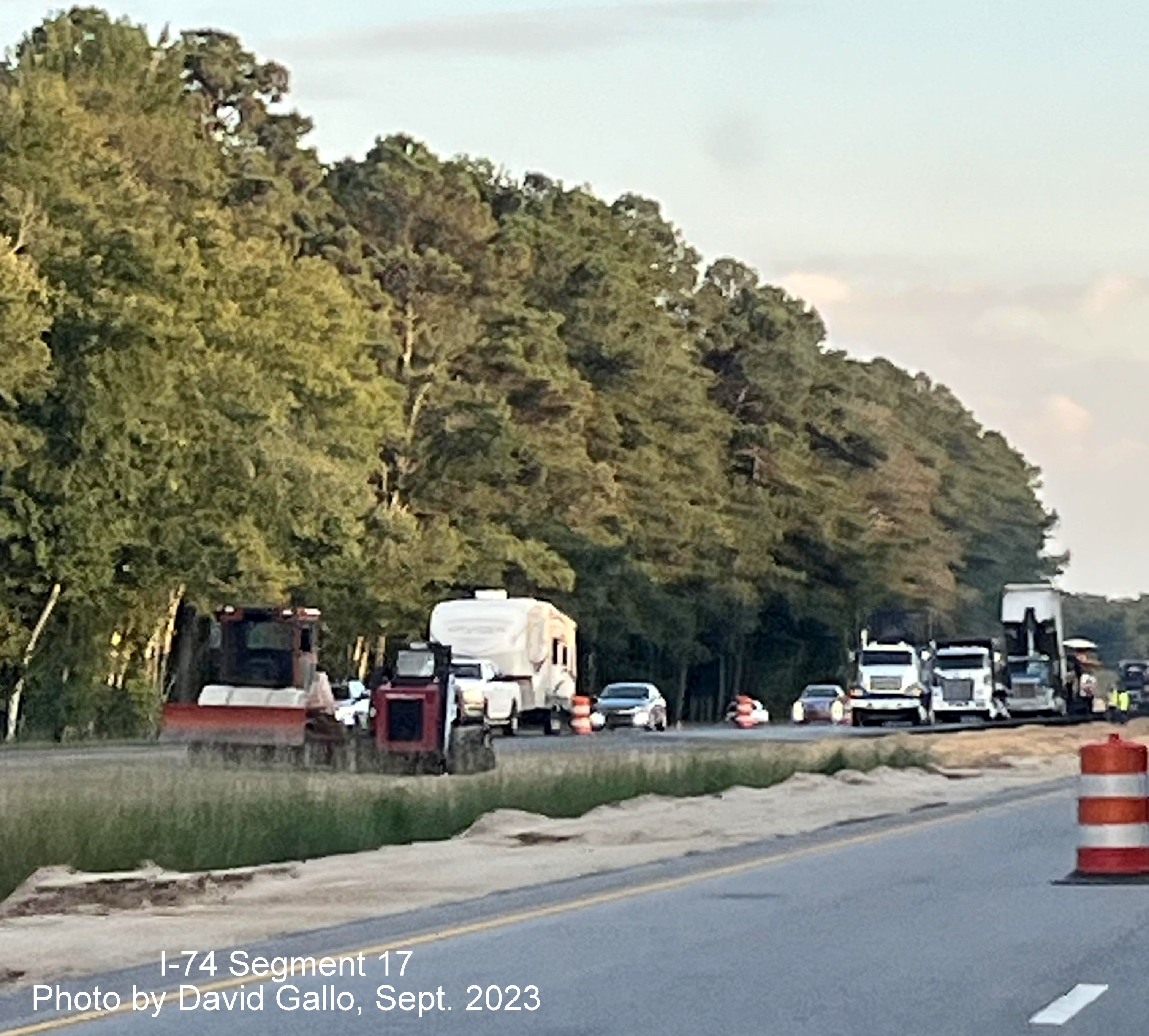 Image of grading along closed left lane after the formerly open NC 72 intersection on 
         US 74 West in interchange project work zone, David Gallo, September 2023