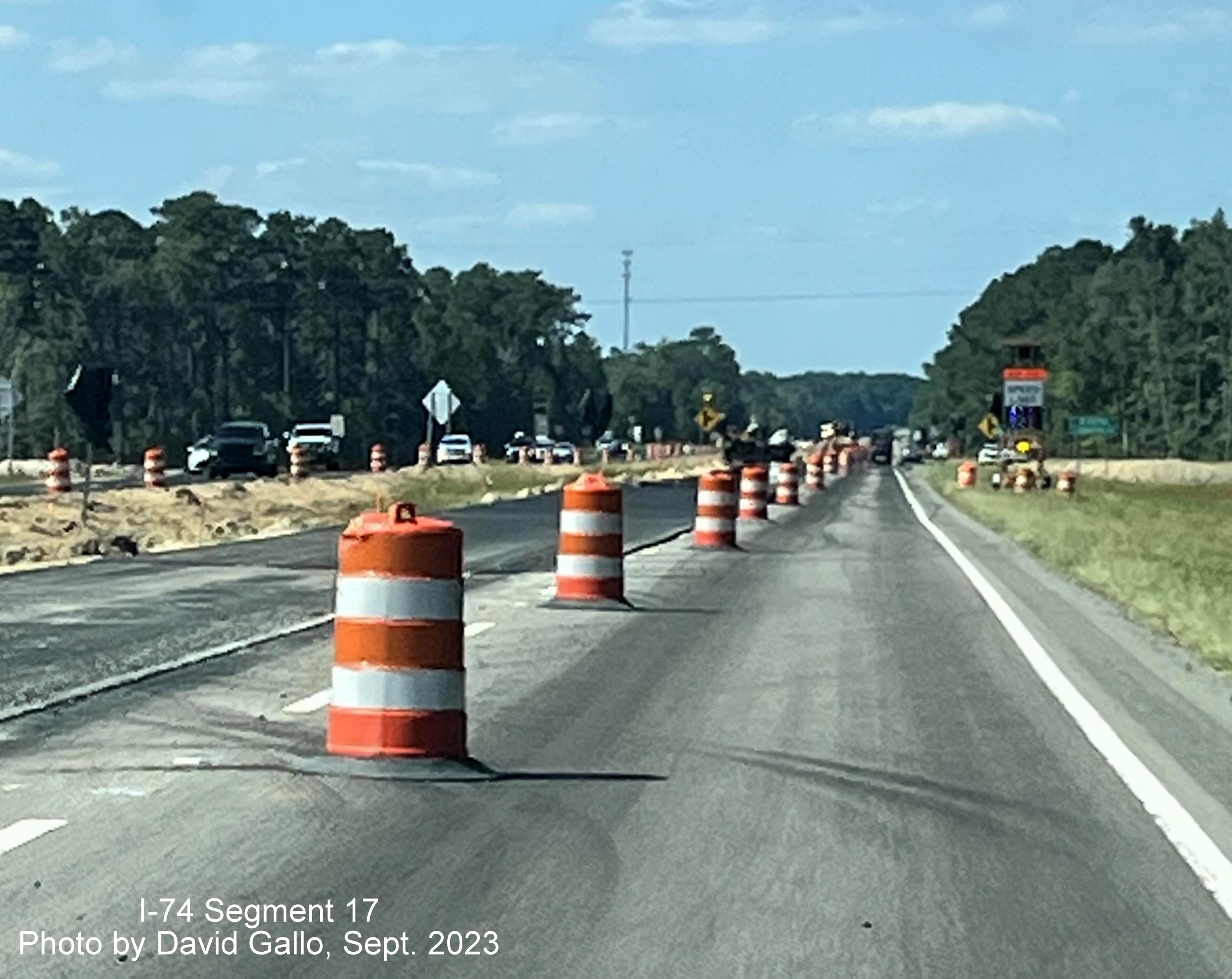 Image of left lane paving after NC 130 West intersection in future interchange work zone on US 74 (Future I-74) West, 
       David Gallo, September 2023