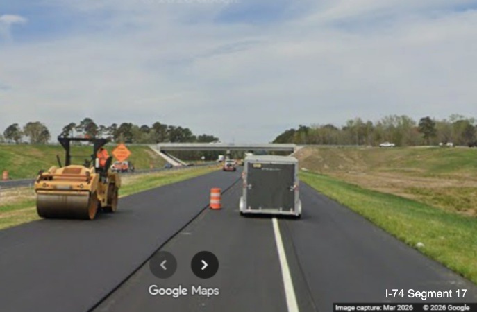 Image of final paving of left lane approaching the future NC 130/NC 72 exit 
	  bridge on US 74 (Future I-74) West in Robeson County, Google Maps Street View, March 2026