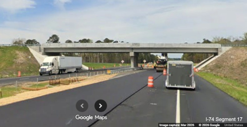 Image of final paving of left lane at the future NC 130/NC 72 exit 
	  bridge on US 74 (Future I-74) West in Robeson County, Google Maps Street View, March 2026