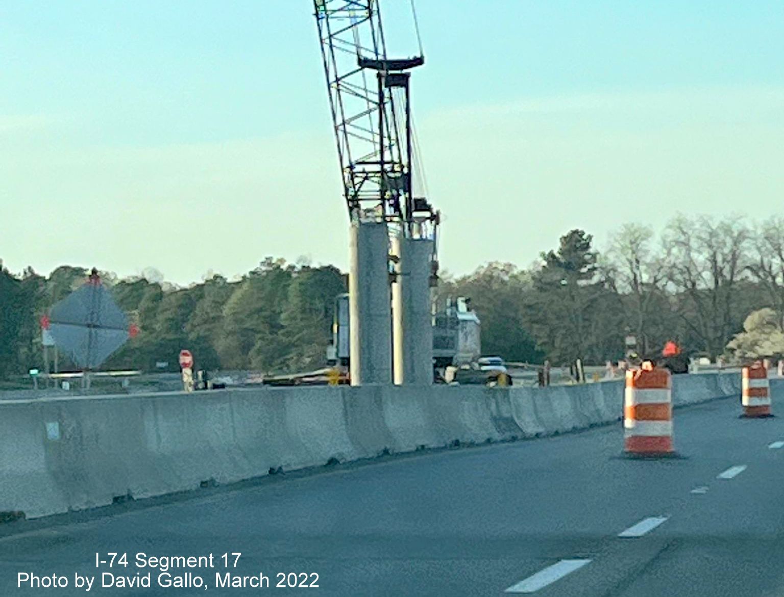 Image of crane helping construct supports for future Boardman interchange bridge on US 74 (Future I-74) West
        , by David Gallo, March 2022