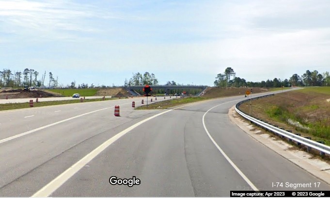 Image of entering exit ramp to Old Boardman Road from US 74/NC 130 East, Google Maps 
        Street View image, April 2023