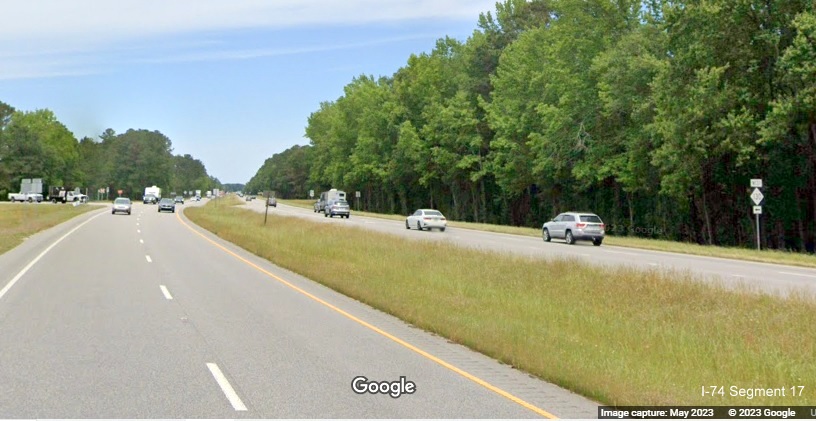 Image of future interchange site at the current intersection of US 74 West and NC 130 West in Robeson 
        County, Google Maps Street View, April 2023