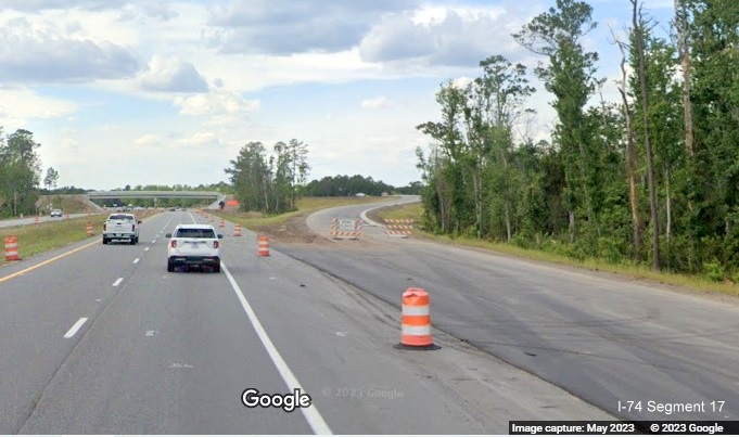 Image of nearly completed exit ramp from US 74/NC 130 West in Boardman prior to Old Boardman Road bridge, Google Maps 
        Street View image, April 2023