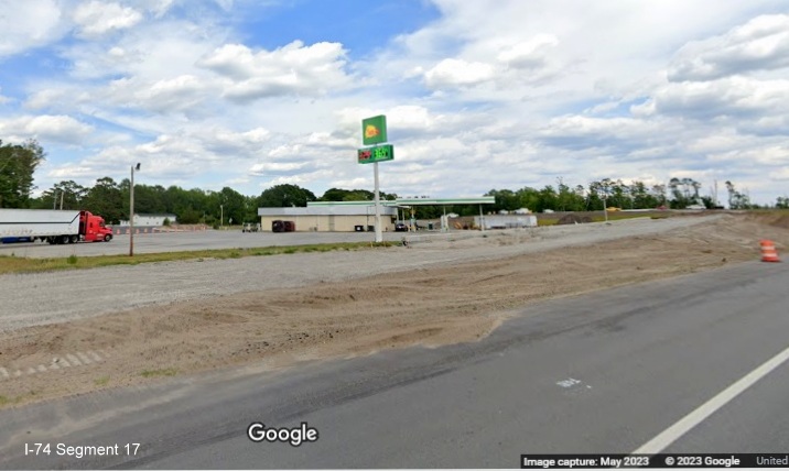 Image of future on-ramp to US 74/NC 130 West from Old Boardman Road under construction, Google Maps 
        Street View image, April 2023