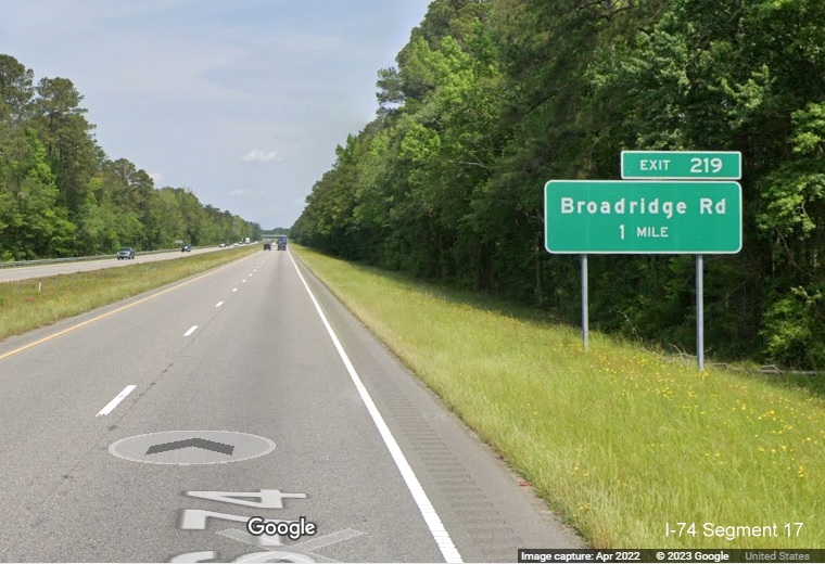 Image of ground mounted 1 mile advance sign for Broadridge Road exit on US 74 (Future I-74) West in Robeson County, Google Maps Street View, April 2022