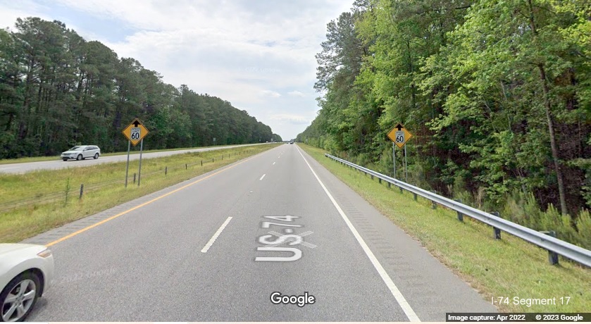 Image of Reduced Speed advisory sign marking end fo US 74 (Future I-74) Freeway in
        Robeson County, Google Maps Street View, April 2022