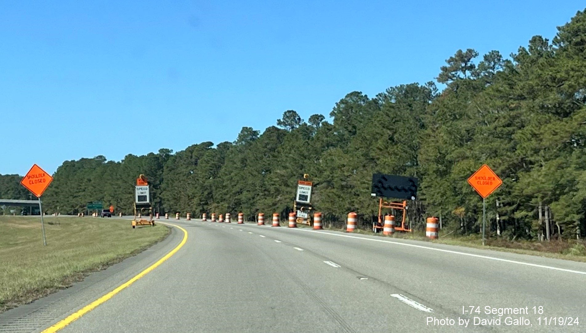 Image approaching construction zone for new Lake Waccamaw interchange on US 74/76 (Future I-74) 
       West, by David Gallo, November 2024