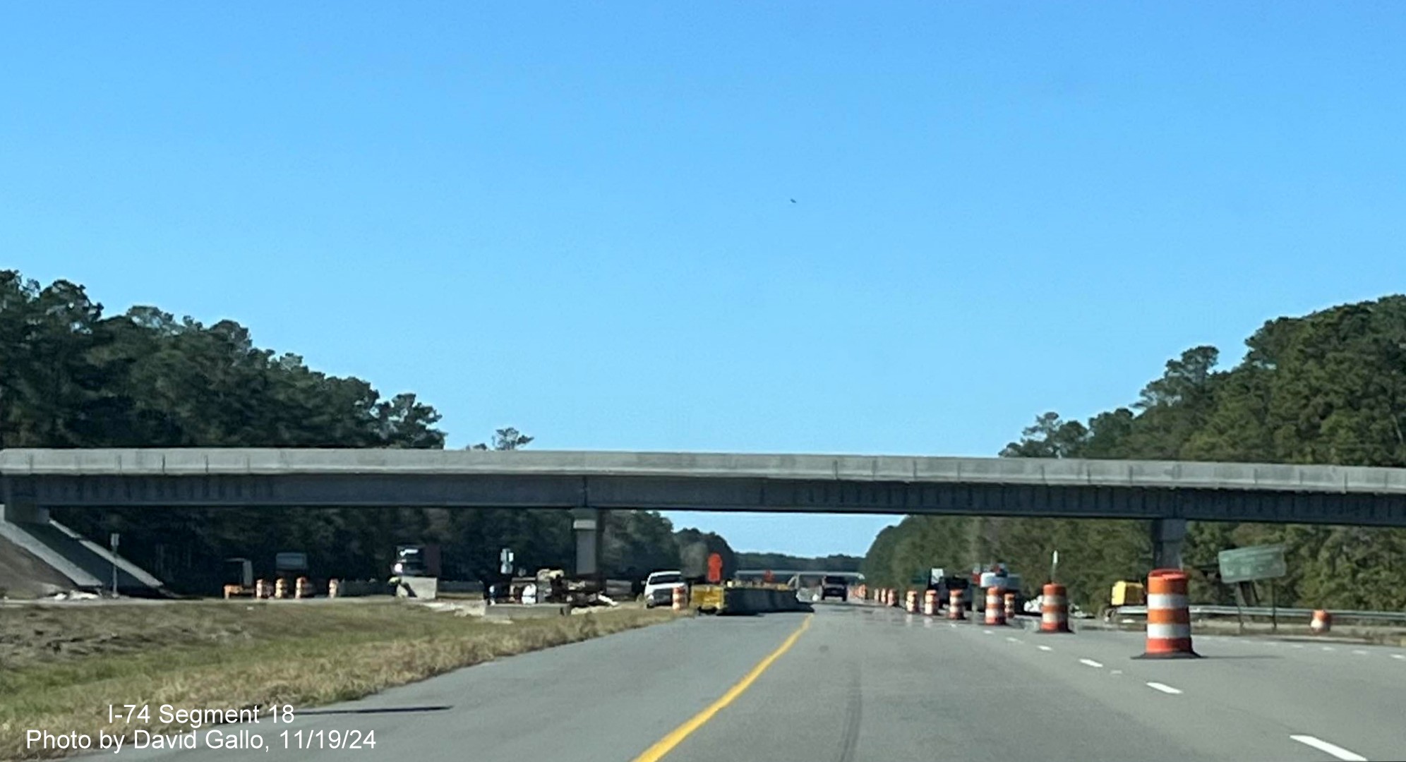 Image approaching the new Old Lake Road bridge in Lake Waccamaw on US 74/76 (Future I-74) 
       West, by David Gallo, November 2024