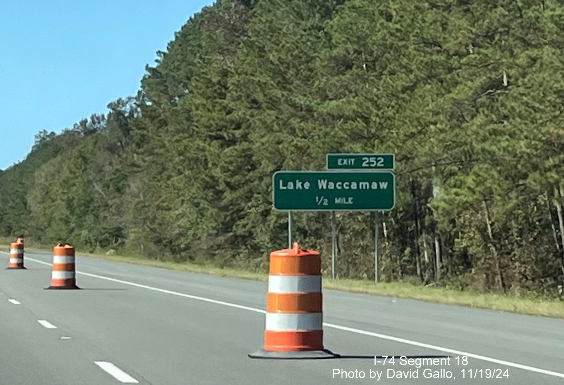 Image of new 1/2 Mile advance sign for Lake Waccamaw interchange on US 74/76 (Future I-74) 
       West, by David Gallo, November 2024